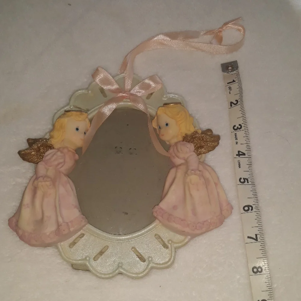 Angel photo frame with pink ribbon